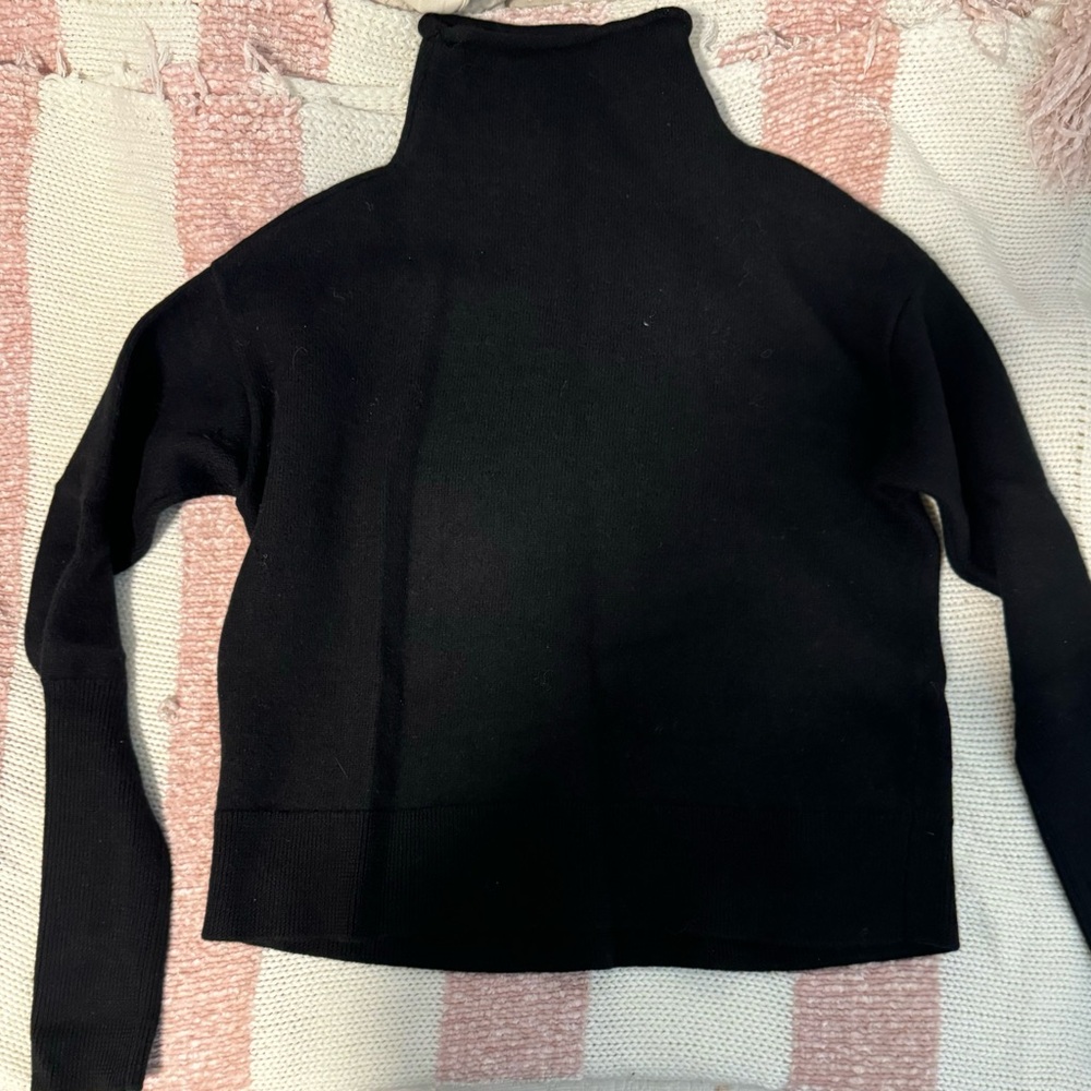 Black sweater.
